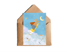 Lade das Bild in den Galerie-Viewer, süße Einschulungskarte für einen großen Meilenstein mit Illustration eines Hasen auf einer Schultüte als Rakete, der in einen Sternenhimmel aufsteigt