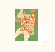 Lade das Bild in den Galerie-Viewer, Weihnachtskarte Weihnachtsbäckerei mit weihnachtlicher Illustration zweier Plätzchen backender Handpaare