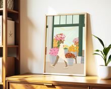 Lade das Bild in den Galerie-Viewer, detailliertes florales Bild mit einer Frau vor einem Blumenmarkt
