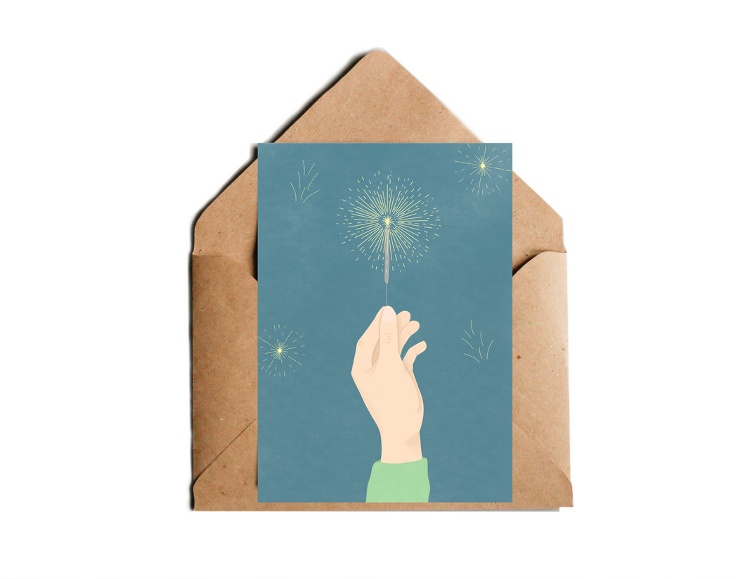 Silvester Karte mit Illustration einer Hand mit Wunderkerze